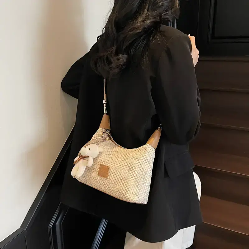 Women’s hand -craved beige waffle shoulder bag with teddy keychain in Lahore