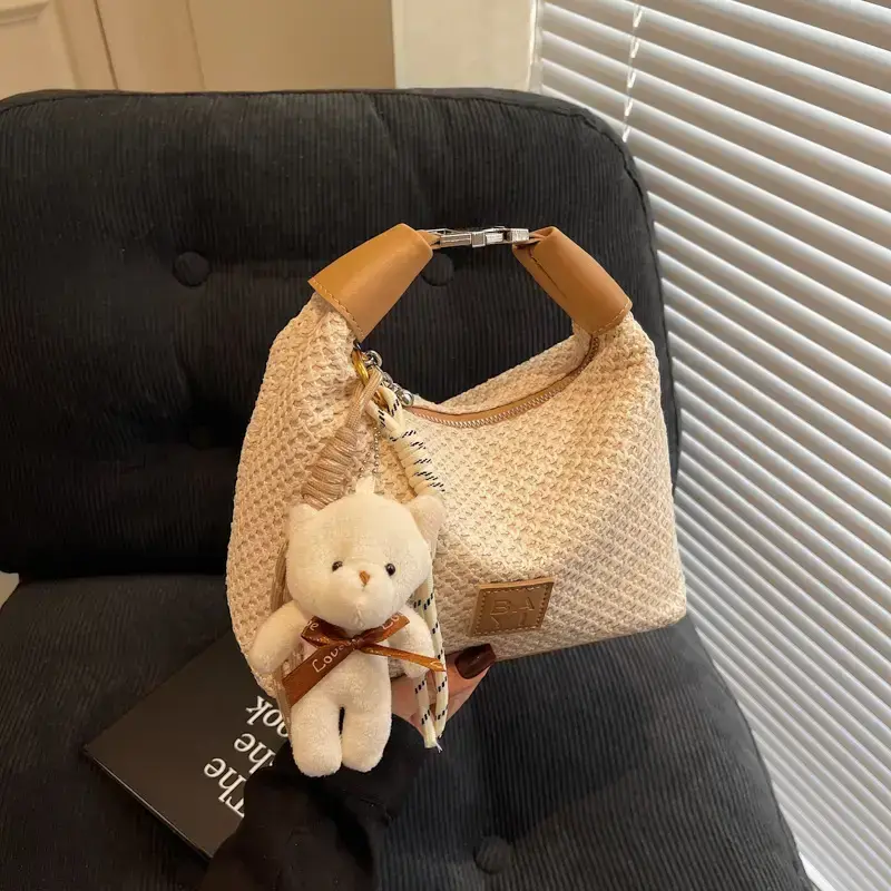 Women’s hand -craved beige waffle shoulder bag with teddy keychain — photo 3