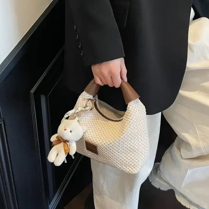 Women’s hand -craved beige waffle shoulder bag with teddy keychain — photo 2