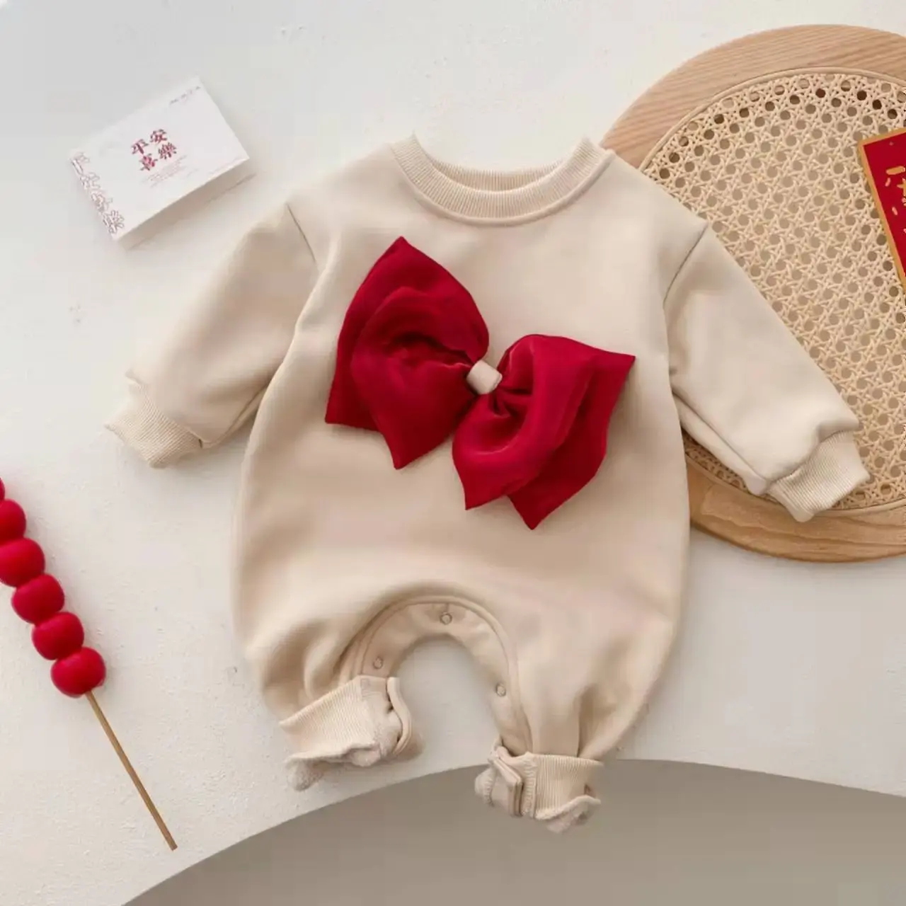 Korean style fleece lined baby romper with bow in Lahore